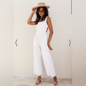 Brand new never worn open back white jumpsuit